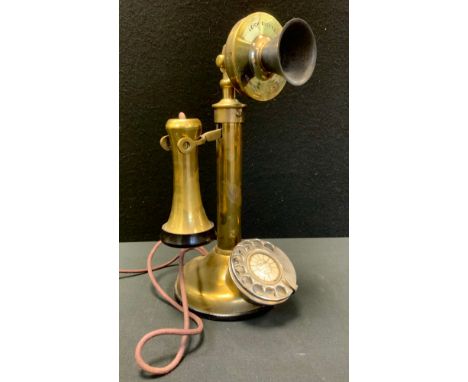 An early 20th century Leich Brass candlestick telephone,  silvered dial, bakolite mouth piece, impressed marks, dated 1925, 3