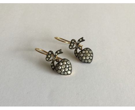 A pair of Victorian style pearl and diamond drop ear pendants. Approx. 3 grams. Est. £30 - £50.
