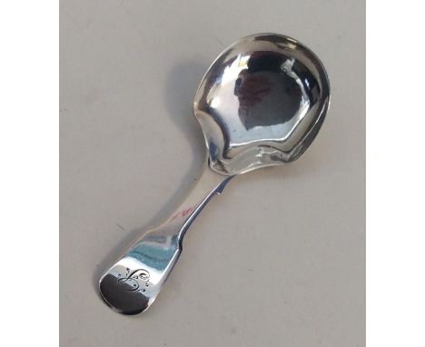 A Victorian silver fiddle pattern caddy spoon. Birmingham. By George Unite. Approx. 12.2 grams. Est. £50 - £80.