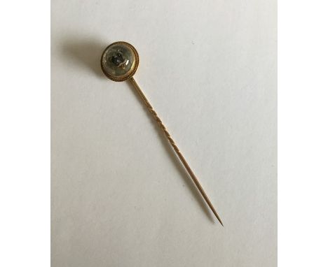 A high carat Essex crystal stick pin with bead decoration. Approx. 6.2 grams. Est. £80 - £120.