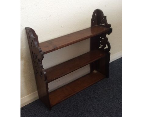 A Victorian mahogany wall shelf. Est. £20 - £30. 