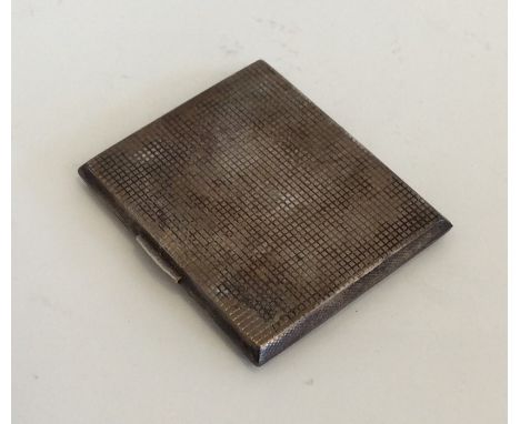 A heavy engine turned silver cigarette case. Birmingham. Approx. 102 grams. Est. £20 - £30.