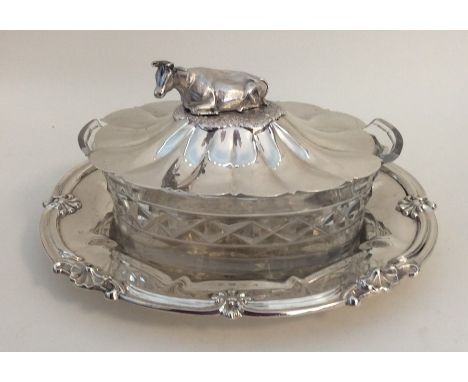 A good quality rare silver and glass butter dish on stand with cow finial. Sheffield 1842. By Henry Wilkinson. Approx. 404 gr