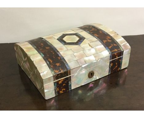An Antique MOP and tortoiseshell dome top caddy. Est. £100 - £150.