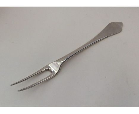 A rare Georgian silver two prong trefid fork. London 1708. Approx. 48 grams. Est. £450 - £500.