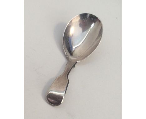A Victorian silver fiddle pattern caddy spoon of plain form. London. By George Adams. Approx. 12.7 grams. Est. £50 - £60.