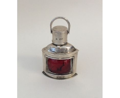 An unusual Victorian silver lighter in the form of a nautical ship's lamp. London. By SJ. Approx. 112 grams. Est. £300 - £400