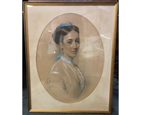 WILLIAM LUCAS (British 1840 – 1895):  A large framed and glazed bust size pastel portrait of a lady with blue ribbon wearing 