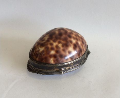 A rare Continental silver snuff box mounted with a shell to lapis base. Apparently unmarked. Approx. 112 grams. Est. £200 - £