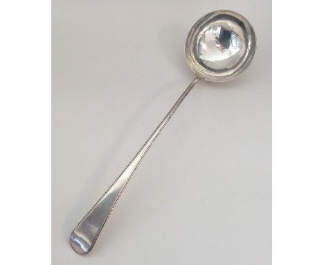 A good Georgian silver bead edge soup ladle. London. By George Smith. Approx.155 grams. Est. £180 - £220.