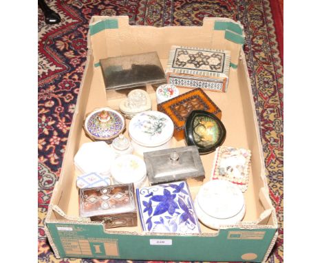 A box of trinket boxes to include ceramic, wood, metal examples.