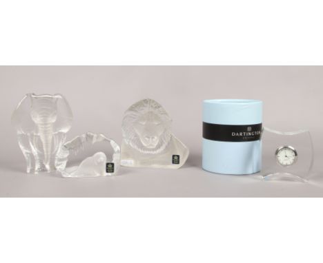 Three Royal Krona lead crystal paper weights, along with a boxed Dartington crystal mantle clock.