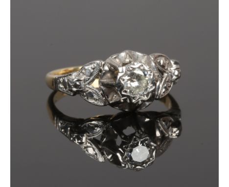 An Art Deco 18ct gold and platinum diamond solitaire ring, stone approximately .25ct size N.