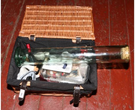 A wicker basket of miscellaneous including Rotary watch box, vintage buttons, sheep Netsuke, large glass storage jar etc.