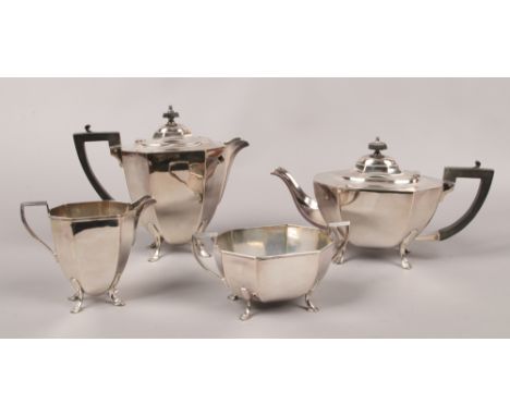 A silver plate four part tea service.