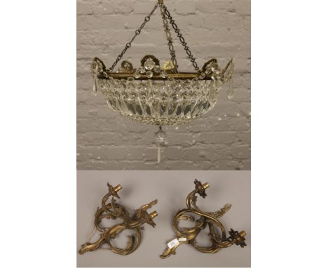 A cut glass and brass multi droplet shade, along with a pair of two branch floral design wall lights. (Width of light 43cm)