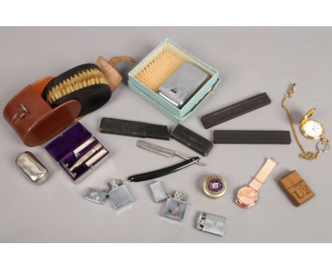 A group lot of collectables to include watches, vintage shaving set, lighters etc.