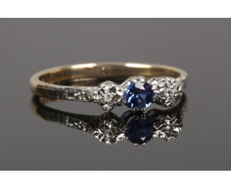 A 9ct gold sapphire and diamond 3 stone ring, size R.