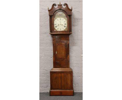 A 19th Century oak and mahogany 8 day long case clock with painted arch top dial and subsidiary seconds