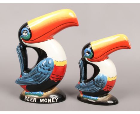 Two Guinness ceramic advertising collectables both formed as toucans, one a money box, the other a jug, tallest 21.5cm.