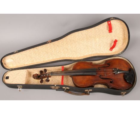 A cased vintage violin in need of restoration. (Back Length 35.5cm)