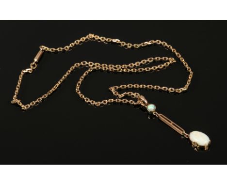 A 9ct gold and opal drop pendant on chain.&nbsp;