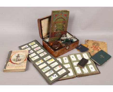 A Victorian burr walnut box inlaid with mother of pearl bird carvings, along with a Jerusalem box and contents of ephemera to