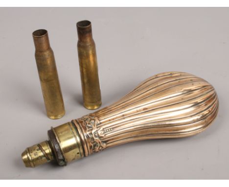 A 19th Century G &amp; J W Hawksley, Sheffield, brass and copper powder flask, along with two 15 caliber bullet casingsCondit