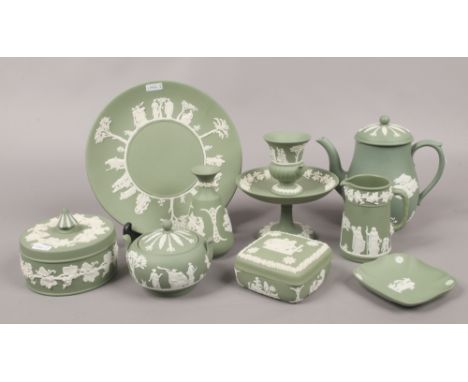 A quantity of green Wedgwood Jasperware including coffee pot, milk jug, trinket boxes, vases etc.