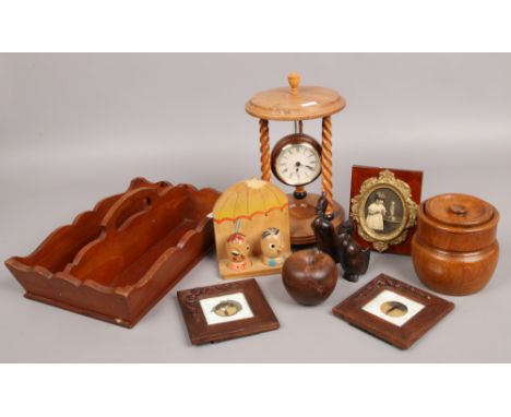 A group of collectable wooden items to include cutlery tray, barleytwist clock, novelty cruet set etc.