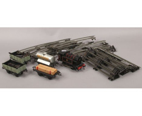 A Hornby Type 40 o gauge clock railway set to include track, engine and rolling stock.
