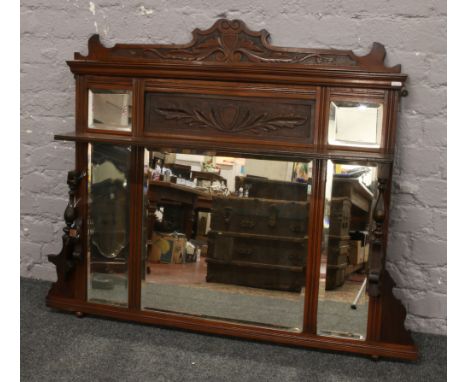 A Victorian carved mahogany over mantle mirror.Condition report intended as a guide only.One shelf support in need of repair.