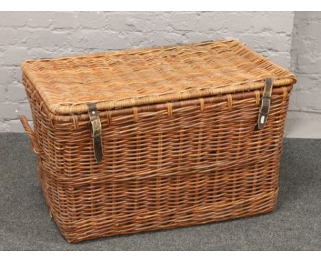 A large wicker hamper basket.