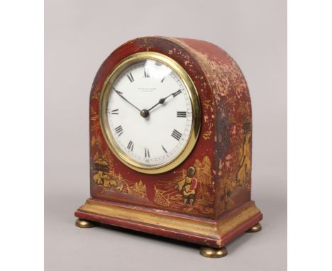 An early 20th century chinoiserie 8 day mantle clock by Mappin &amp; Webb the case decorated red and with figures in the land