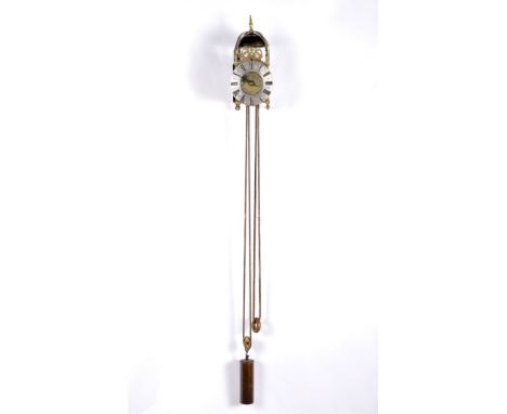 A wall "Lantern clock", brass and steel, polished, engraved and silvered brass dial with black roman numerals, autonomy aroun