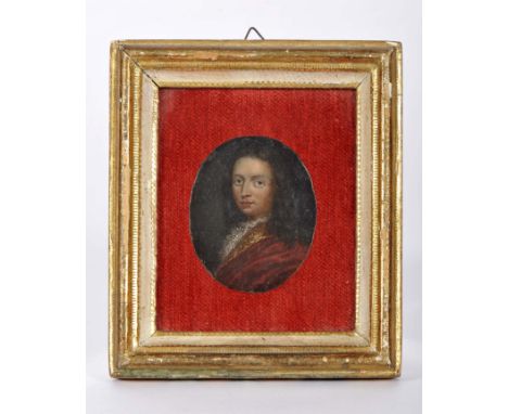 A portrait of a gentleman, an oval miniature on copper, European school, 17th/18th C., restoration to the pictorial layer, Di
