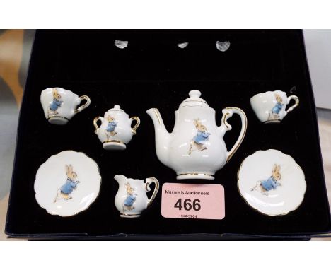 Peter Rabbit 100 year anniversary miniature tea set for two with teapot, sugar, cream jug, two cups and saucers and tray by R