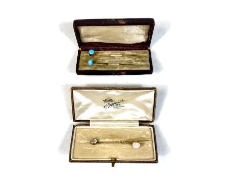 A cased opal and 9ct gold stick pin and two others set with Turquoise stones cased and another mother of pearl similar