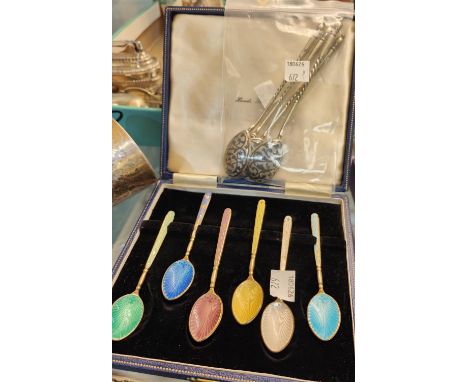 A cased set of 6 silver gilt and coloured enamel coffee spoons, Birmingham 1961; a set of 4 continental anointing spoons with