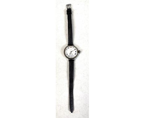 An early 20th century Elgin hallmarked silver wristwatch with white enamel dial and Roman numerals, on black leather strap