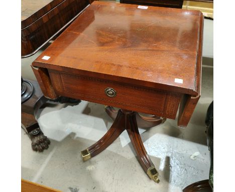 A dwarf sofa/ occasional table 