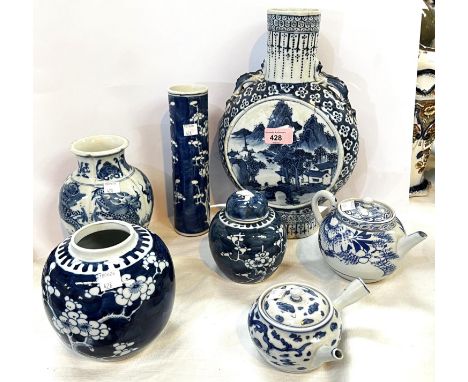A selection of blue and white ceramics including moonflask, small ginger jar with lid, another with no lid, 2 teapots etc. Co