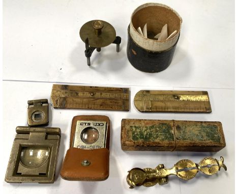 A set of sovereign scales by Harrison in original box (box worn); a large brass magnifying thread counter and another smaller