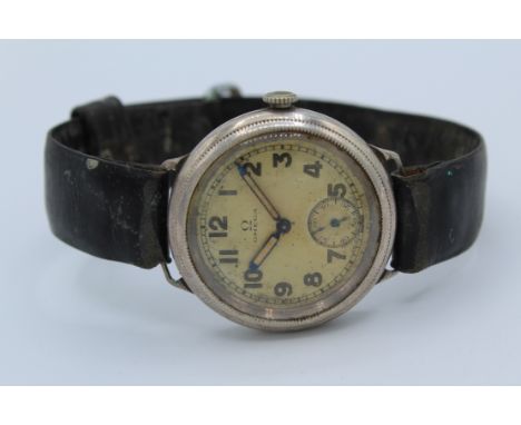 Vintage WWII era men's Omega military wristwatch. Fixed lugs, some lume has come away from the minute hand. Watch wound past 