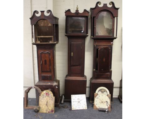 An early 19th century oak, mahogany crossbanded longcase clock, with eight day bell striking movement and arched 13'' moon ph