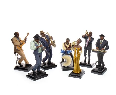 LOT OF SEVEN FIGURES OF JAZZ MUSICIANS, comprising a singer, saxophonist, drummer, guitarist, trumpeter, keyboard and clarine