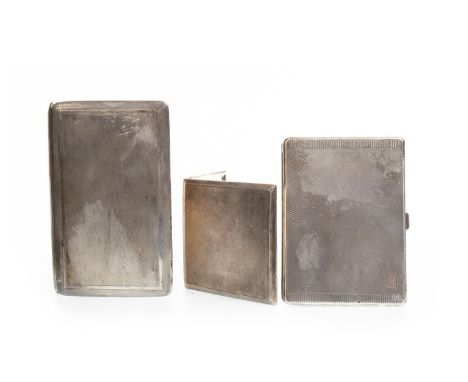 THREE EARLY 20TH CENTURY SILVER CIGARETTE CASES, Birmingham marks, each with engine turned exteriors and dedication to interi