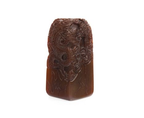 CHINESE HARDSTONE SEAL, carved with dragons, 11cm high