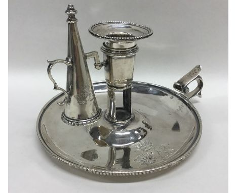 A good Georgian silver chamber stick with beaded rim with matching snuffer and crested to each. London 1843. By IC. Approx. 2