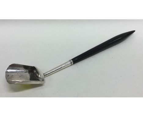 A large silver mounted caddy scoop with tapering handle. Birmingham. By IT. Est. £40 - £60. 